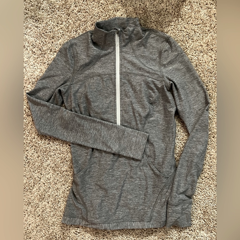 Like New Lululemon Half Zip Define Pullover Size 6. Heather Gray color.